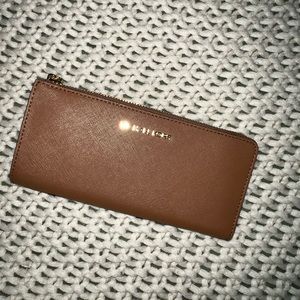 Brown Michael Kors wallet.
